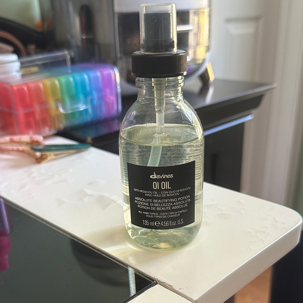 Davines OI Oil Hair Elixir great for thick hair .